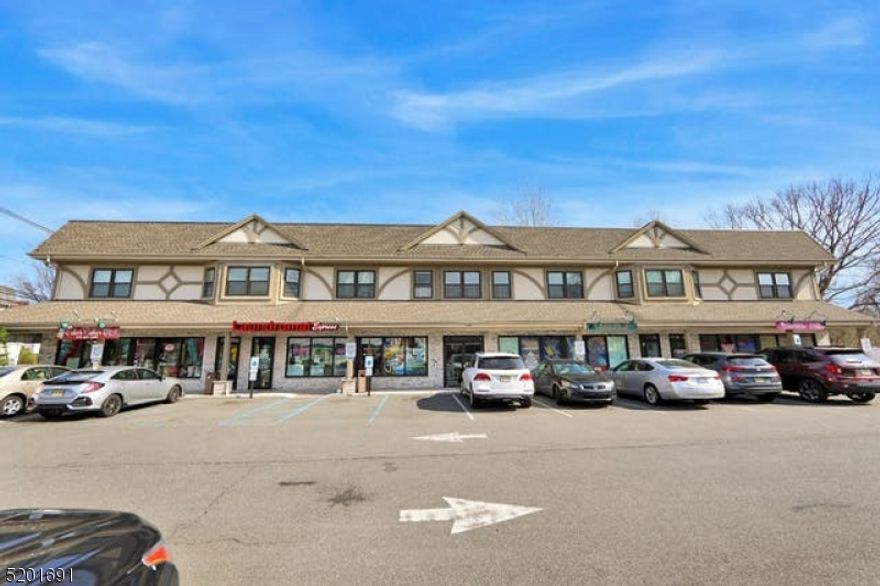 This mixed use building was built in 2015 and consists of 5 residential units over 4 commercial units, 30 parking spots.   Each residential unit is one bed/one bath with all ss appliances including refrigerator, dishwasher, microwave, central air and h/w floors with coin op laundry on premises.  All separate utilities and fully Leased.   The laundromat is owned and run by seller and is available for sale as well.