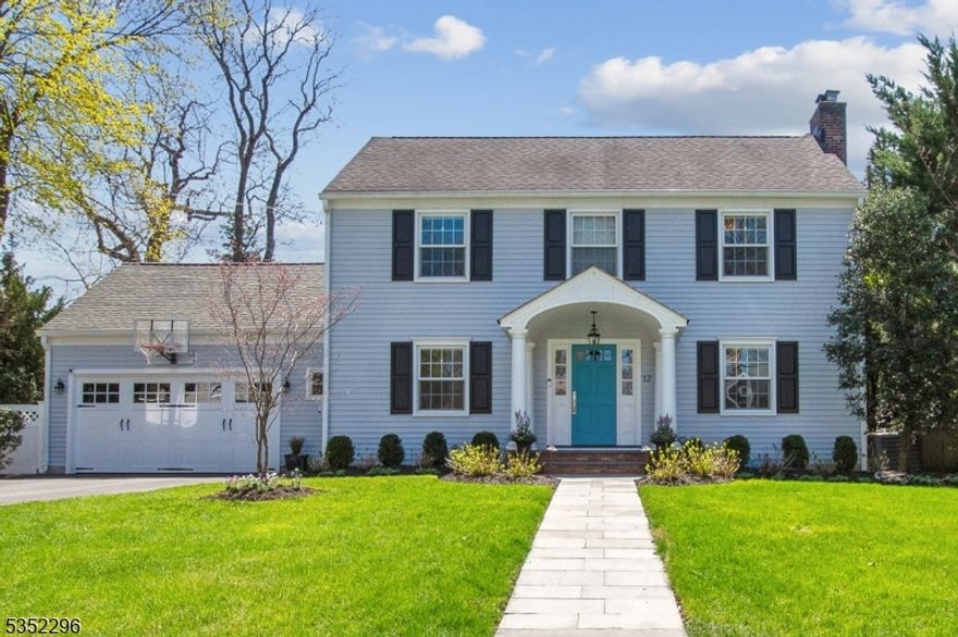 Experience the best of both leisure living and formal entertaining in this sophisticated four bedroom classic Colonial, set in a highly desirable neighborhood with excellent curb appeal. Located near downtown, Midtown Direct trains, and top-rated schools, including Lincoln-Hubbard Elementary, this home blends timeless charm with modern conveniences. Inside, a chef's gourmet kitchen anchors the heart of the home, while outside, a fully equipped kitchen w/high end appliances, wet bar, tiered patios, and multiple seating areas create an ideal space for hosting and seamless indoor-outdoor living. Step into freshly painted interiors and hardwood floors throughout. Local Cabri designed kitchen w/crisp white cabinetry, pantry and Sicilian granite countertop island/prep station w/sink, beverage drawers, storage and seating set atop radiant heated hardwood floors. 2022 Luxury appliances include a SubZero refrigerator, Miele dishwasher, Wolf range oven and hood. Living rm w/fireplace, 1st flr bed/office, family rm w/vaulted ceiling, open concept kitchen dining area, direct access to patio through double glass French doors. Custom mud room access to oversized two-car attached garage w/workshop area. Primary bedroom en-suite, walk-in closet, marble vanity w/Kohler Spa WaterTiles shower. 2 add'l bedrooms served by hall bath w/tub shower. Radiant-heated floors in both baths. Rec rm, laundry, pantry and temp-controlled wine room on finished lower level. Add'l features and updates avail.