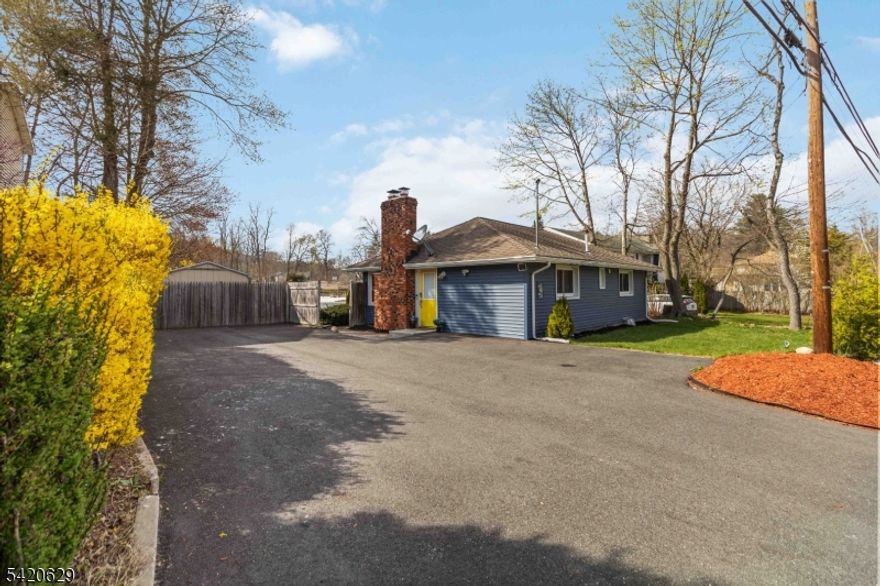 Cozy ranch sitting pretty on a level lot with new dock and beautiful lake views. House is over 1200 sq ft with renovated white kitchen center island, that opens to a family room with wood burning fireplace and large picture window with view of the lake. Separate formal dining room and living room plus 2 bedrooms and full bath complete this ranch. Oil tank has been moved to outside, floors were redone, basement is full and unfinished but  very usable with Bilco doors to the backyard.  Comes with 6 parking spaces.  Within the last 5 yrs installed new water purifier,  siding,  Gutter Guards, kitchen, bathroom, plumbing, flooring, hot water heater, floating dock, shed,, HVAC unit in living room, windows, driveway , flood lights in front and backyard  and updated electrical. Nothing to do but move in and enjoy the summer lake.