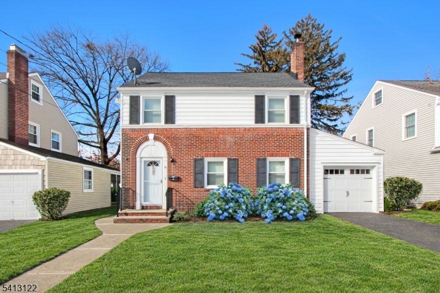 This Classic Colonial Is In The Highly Sought-After Brookdale Section of Bloomfield, And It Sits At The Entrance Of The Stunning 121-Acre Brookdale Park! This Beautifully Maintained Home Blends Timeless Character With Thoughtful Updates Throughout. The Gorgeous, Renovated Kitchen Features Crisp White Cabinetry, Granite Countertops And A Center Island. Entertain Effortlessly In The Large Formal Dinning Room, Or Gather Around The Handsome Wood Burning Fireplace That Anchors The Inviting Living Space! A Very Sunny Three-Season Room Is Right Off The Kitchen And Leads Right Out To a Lovely Patio And Fully Fenced-In Backyard. Hardwood Floors Run Throughout The Home. Second & Third Floors Offer Four Bedrooms, Including A Fabulous Updated Bathroom Complete With A Roomy Stall Shower & A Clawfoot Soaking Tub!! The Third Floor Offers Flexible Space Ideal As A Combined Office And Bedroom, Guest Suite, Or Creative Studio. Freshly Painted And In MINT CONDITION, This Home Also Has Abundant Storage & Finished Basement, And An Attached Garage. Ideally Located Bordering Montclair & Glen Ridge, With A Jitney To NYC Trains And A Bus At The Corner, This Home Offers The Perfect Blend Of Suburban Charm And Commuter Convenience. Most Desirable Brookdale Grammar School Steps Away! Davidson Is An Intimate Cul-De-Sac Which Backs Up To Brookdale Park!!
