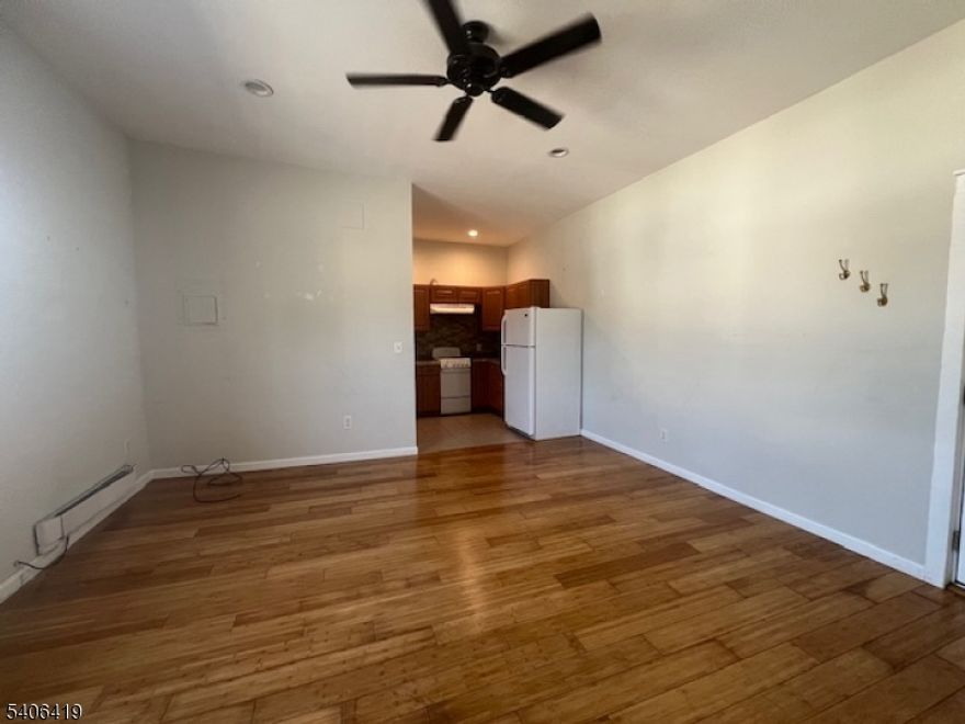 Nice second floor apartment with parking and laundromat on the first floor. Located within close proximity to the shopping areas! This apartment features a living room/dining room combo, one bedroom, kitchen and a full bathroom. Hardwood floors throughout.