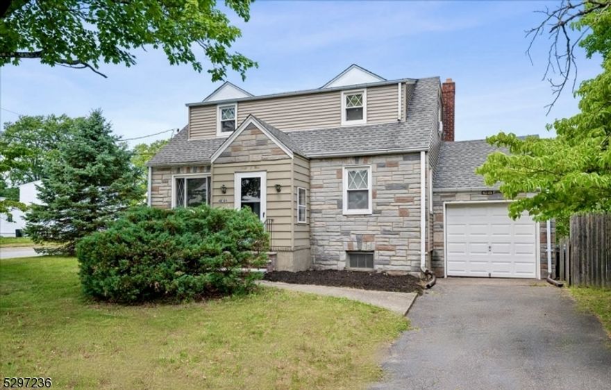 Attractive and spacious corner lot Cape Cod with 1-car garage in the heart of Fair Lawn NJ! Nice curb appeal with stone and vinyl siding, a good sized side yard patio and Just minutes to shopping, dining, house of worship, Garden State Parkway, George Washington Memorial Park, Panama Golf Course, Ringwood County Club, Arola Country Club, and public transportation to NYC on Saddled Brook River Road. Step in through the mudroom/vestibule into the sun-filled living room, enjoy the freshly refinished hardwood floors through the main floor. Walk from the living room through a decorative archway to the eat-in kitchen with access to the side yard and complete with a new refrigerator and new flooring. The main level has 2 decently sized bedrooms with a main full bathroom. Upstairs you find the large primary suite, complete with a full 3-piece ensuite, 2 closest and a flexible office/den space at the top the stairs, it's the perfect retreat from the main level. Downstairs in the basement, you have your laundry area, unties and more than ample storage, also with high ceilings this is ready to be finished to add even more living space. This charming ready to move cape could be yours!