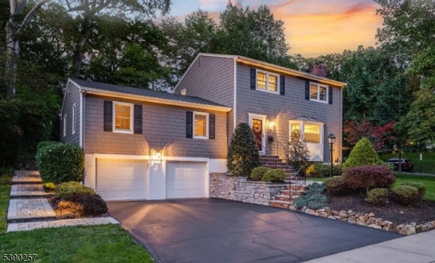 Come home to this exceptional, in-town 4 bedroom, 3 bathroom colonial! With an extremely versatile floor plan this updated Morristown gem with full finished basement, 2-car garage and private yard, checks all the boxes. From the foyer, you are welcomed into a generous living room with wood-burning fireplace and huge bay window that provides tons of natural light. The dining room is open to the kitchen, which was fully updated in 2020 with GE cafe appliances, quartz countertops and timeless white subway tile backsplash. The main level also offers a spacious family room with built-in bookcases, a guest bedroom that can function as an office, a full updated bath, laundry area and charming 3-season room. The main level hardwood floors continue upstairs to the large primary with ensuite, two nicely-sized bedrooms and another full bath. The fully finished lower level provides a huge recreation space for media, gym, playroom and offers a mudroom space from the two-car garage. Outside the newer paver patio offers a wonderful private retreat directly from the three-season room. The home offers excellent curb appeal as the walkways, siding and windows were all recently replaced and is nicely accented by the professional landscaping. A commuters dream and less than a mile to all the downtown shops, restaurants, entertainment and the Morristown train station, this house offers in-town living at its absolute best.