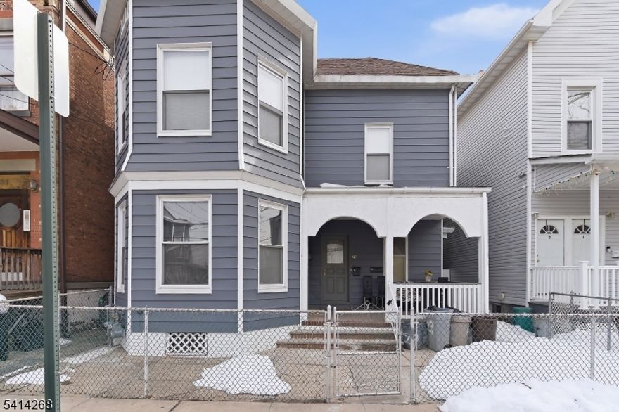 Enormous two-family home offering a whopping 3,917 square feet of living space, incredibly spacious rooms in both units and located near new large scale luxury apartment complexes!! Monthly parking permits available for purchase 1 block away from home. Each unit features, tall ceilings, and ample closet space throughout. The property includes a bonus attic level with a kitchenette and separate entrance, offering additional flexibility and potential. A nice bonus is the private backyard ideal for outdoor enjoyment. Conveniently located near major transportation, shopping, and local amenities.Great opportunity for owner-occupants or investors looking for a solid multi-family property.