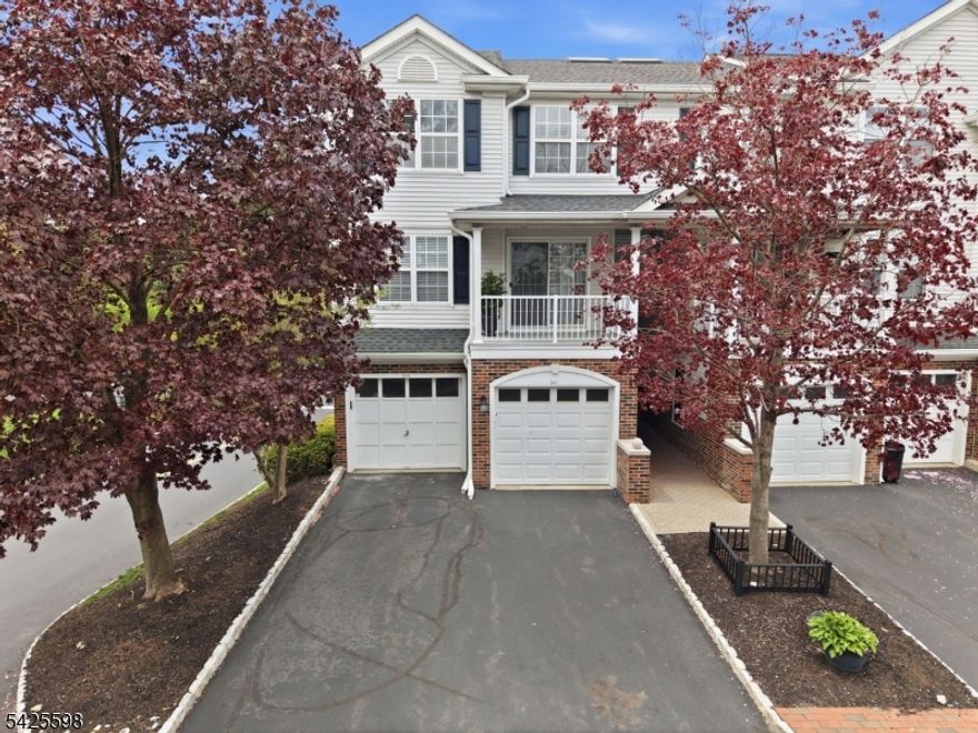Beautifully maintained 2-bedroom, 2.1-bath end-unit townhouse in a highly desirable community! This one-owner home features a bright, open floor plan with freshly painted interiors and abundant natural light throughout. The main level offers a seamless flow between the Living Room, Dining Room, and Kitchen?ideal for everyday living and entertaining. Sliding glass doors lead to a private patio, perfect for outdoor enjoyment. A convenient powder room, pantry, and laundry area complete this level.  Upstairs, you?ll find a spacious second bedroom, full hall bath, and a generous Primary Suite, walk in closet, and an en-suite bath featuring a large vanity, stall shower, and tub/shower combination. The fully finished walk-out basement provides additional versatile living space, ideal for a recreation room, home office, or media area, along with ample storage.  Additional highlights include an attached one-car garage with direct entry and the added privacy of an end-unit location. Enjoy community amenities such as a pool and playground, all conveniently located near major highways, shopping, dining, and downtown. This home offers a perfect blend of comfort, convenience, and low-maintenance living.