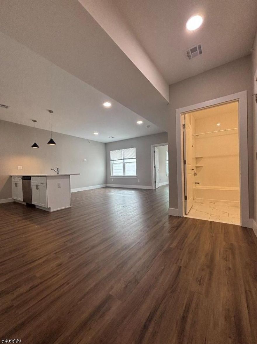 Beautifully renovated 1 bedrooms apartment for rent in Newarks Ironbound district. This gorgeous apartment features an open concept style of living with tons of sun light, an eat in kitchen with stainless steel appliances, a peninsula/island to entertain guests, a large living area, spacious bedroom, central air & laundry hook up in unit. This apartment is conveniently located close to shopping, dining, night life, you name it. It is also a short walk to Newark penn station with direct lines to NYC (20 minute commute). Credit and Background check required, Pet friendly.