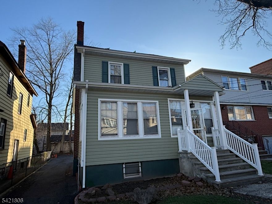 This move-in-ready home on the Hillside border offers a spacious open layout that seamlessly connects the first-floor living spaces, including a bright living room, a modern kitchen, and a formal dining room. The second floor features three comfortable bedrooms and a full bathroom, while the home's footprint is further expanded by a finished attic and a fully finished basement complete with a bonus room and another full bath. Recent updates, like a newer roof and siding, provide long-term peace of mind, while the inclusion of driveway parking and close proximity to major highways ensures a convenient lifestyle. This turn-key residence perfectly combines a spacious, airy feel with dedicated rooms for work and relaxation in a prime commuter location.