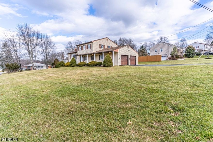 Expansive & spacious custom split has been well maintained & lovingly cared for by the original owners.  Charming front porch/patio with columns welcomes you in. Offering almost 2,000 sqft of living space across 4 floors. Lots of Generous Room Sizes to Spread Out & Make Your Own! Formal living room sits high with tons of natural light overlooking the formal dining. Functional, eat in kitchen opens  to the family room. Foyer, office & powder room complete this floor. Perfect layout for entertaining or just everyday living. Upstairs offers a primary suite w/full bath. 3 addtl bdrms & another full bath w/tub shower. TONS of storage in partial bsmt, shed & oversized 2 car garage. Large deck & corner lot. Privacy fence enhances backyard space. Desirable neighborhood, easy access to major highways & NYC Direct Mass Transit. Great location w/close prox to DWTN Denville, Chester & Dover - TONS of Shopping & Restaurants Nearby. Public utilities.