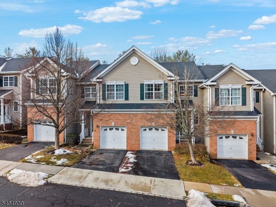 Welcome to this well-maintained 2-bedroom, 2.5-bath townhome in the desirable Montgomery Hills community, offering a Princeton address and top-rated Montgomery Township schools. Built in 2004, this 1,755 sq ft home features a freshly painted interior, updated kitchen with new appliances, recessed lighting, and an EV charger in the one-car garage. The loft provides a dedicated professional office space ideal for remote work. The finished basement offers durable LVP flooring and recessed lighting, creating flexible living or recreation space. Enjoy outdoor living on the Trex deck overlooking the backyard. Additional highlights include two hot water heaters and ample storage. Community amenities include a playground and tennis courts, close to shopping, dining, and major routes.