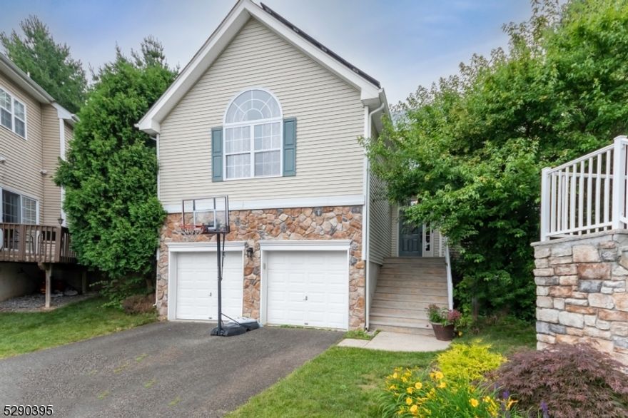 Rare Elmwood model within a cul de sac offers private paver patio in rear yard!  Woodfield neighborhood offers community pool, basketball, baseball, tennis, playground and more.  Updated kitchen with new flooring, large breakfast area, backsplash, quartz countertops, and stainless appliances. Primary suite has vaulted ceiling and full bath with jetted tub, 3 spacious bedrooms, main bath and laundry on 2nd floor. Gas fireplace in family room, finished basement with split unit heat/air conditioning and bar remains. Recessed lighting throughout plus upgraded lighting fixtures. Other features worth mentioning: updated powder room, new front door, new gutters, new wood staircase with aluminum spindles and primary bedroom wood flooring. Excellent Mt. Olive school system and close to Rt. 80, shopping and eclectic dining in downtown Hackettstown. Zip Code is Hackettstown 07840