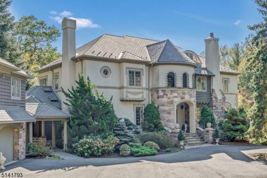 Magnificent custom built estate located in one of the most sought after areas in town! Only approx 20 miles from Manhattan, yet in an oasis of your own. Just under 8700 sq ft of living space, not including the large basement, 2 bedroom carriage house and bonus room over lower garage. Lots of gorgeous detail throughout, including hand carved woodwork, pocket doors and hand painted ceiling. Kitchen once featured in KBB Magazine highlights "3 islands for 3 functions: prep, dining and display"! Quality materials used in the grand kitchen such as bleached maple, granite, mahogany and African slate. Gorgeous family room w wet bar and fireplace where crowds can gather. Stunning library w amazing woodworking. Light filled master bedroom with terrace overlooking spectacular backyard. Bring your coffee! Breathtaking grounds, great for entertaining: beautiful gunite pool w diving board and waterfall, tennis court and lots of lush land. Don't miss this incredible opportunity!