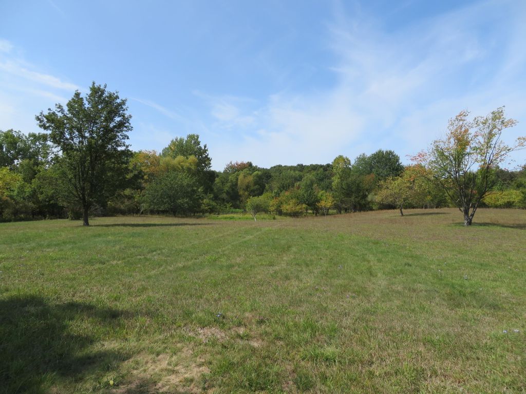 Photo of 5591 Wing Avenue SE, Kentwood, MI 49512 (MLS # 25046451)