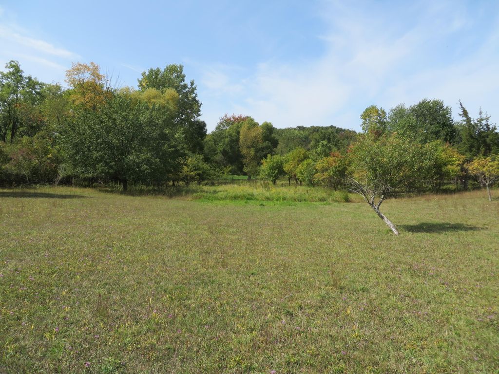 Photo of 5591 Wing Avenue SE, Kentwood, MI 49512 (MLS # 25046451)