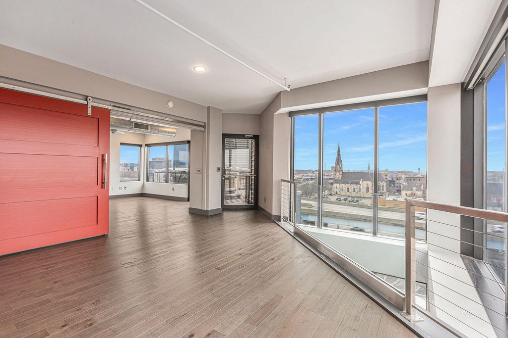 Photo of 600 Broadway Avenue NW #611, Grand Rapids, MI 49504 (MLS # 24005728)