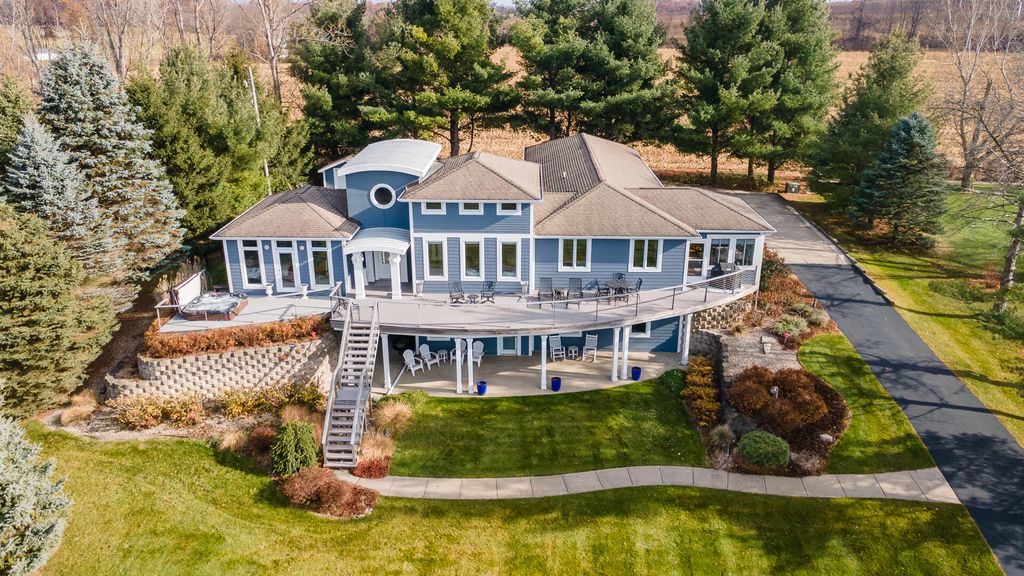 Photo of 11864 5 Mile Road NE, Lowell, MI 49331 (MLS # 25059350)