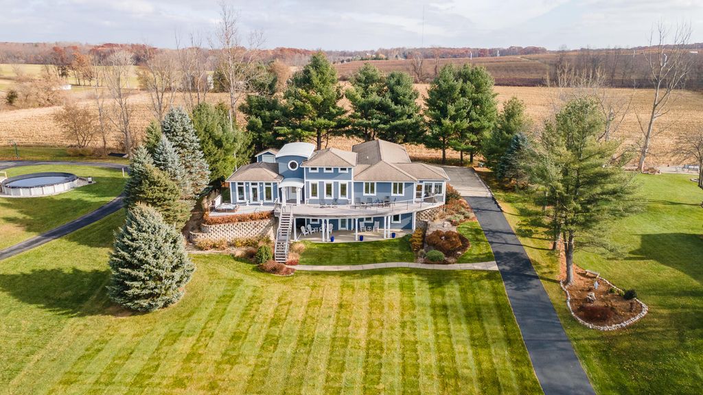 Photo of 11864 5 Mile Road NE, Lowell, MI 49331 (MLS # 25059350)