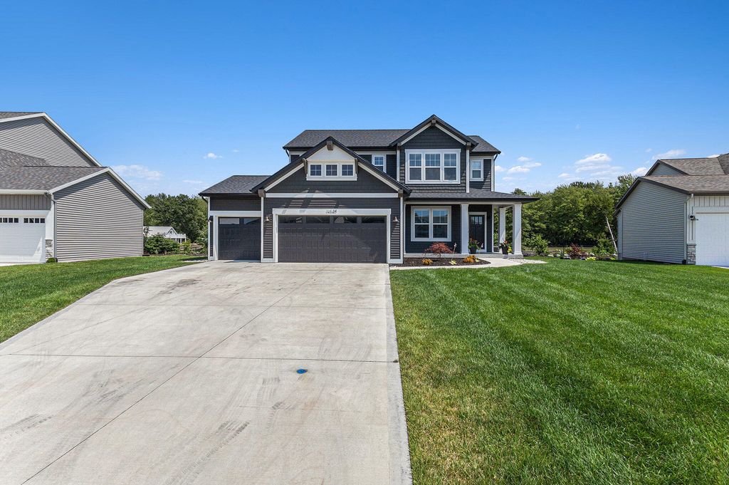 Photo of 12524 Manchester Drive, Grand Haven, MI 49417 (MLS # 25038076)