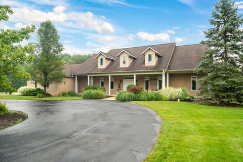 Photo of 5578 Wing Avenue SE, Kentwood, MI 49512 (MLS # 23031676)