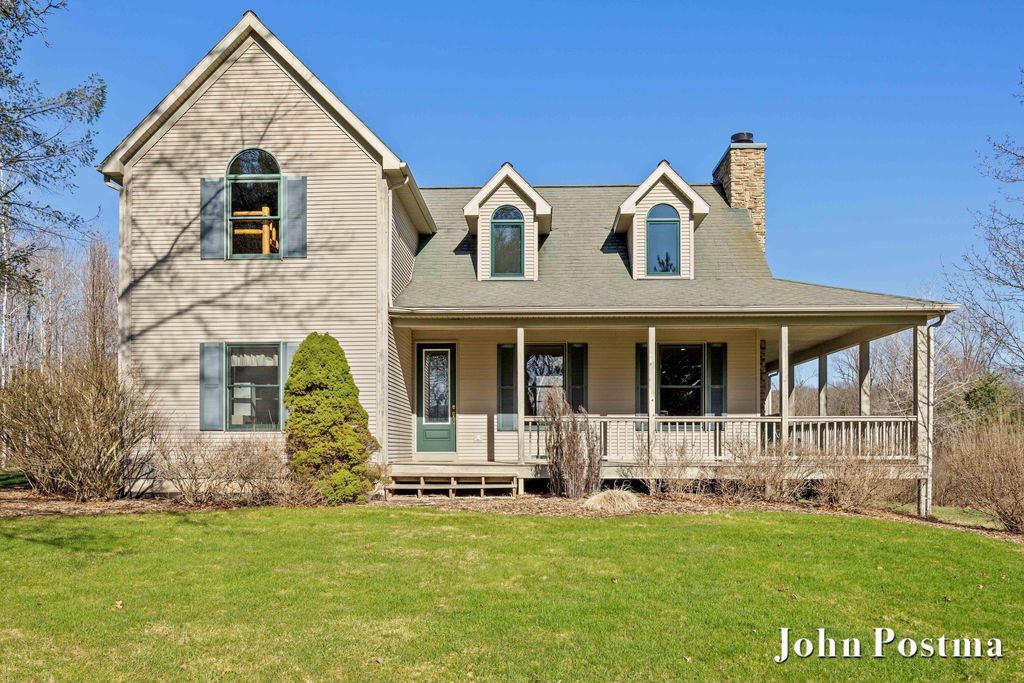 Photo of 2975 Egypt Valley Ave NE, Ada, MI 49301 (MLS # 26015242)