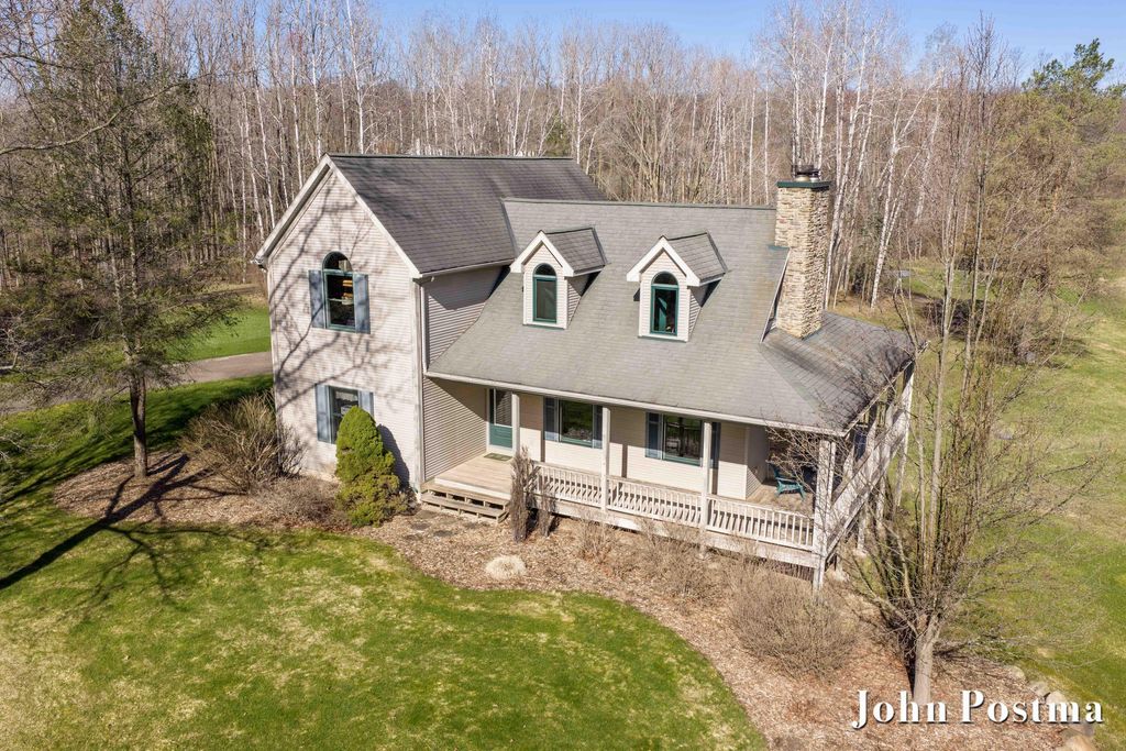 Photo of 2975 Egypt Valley Ave NE, Ada, MI 49301 (MLS # 26015242)