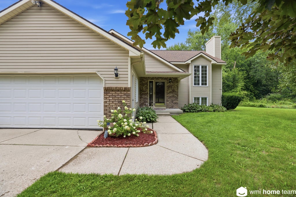 Photo of 5303 Tiffany Avenue NE, Rockford, MI 49341 (MLS # 26042393)