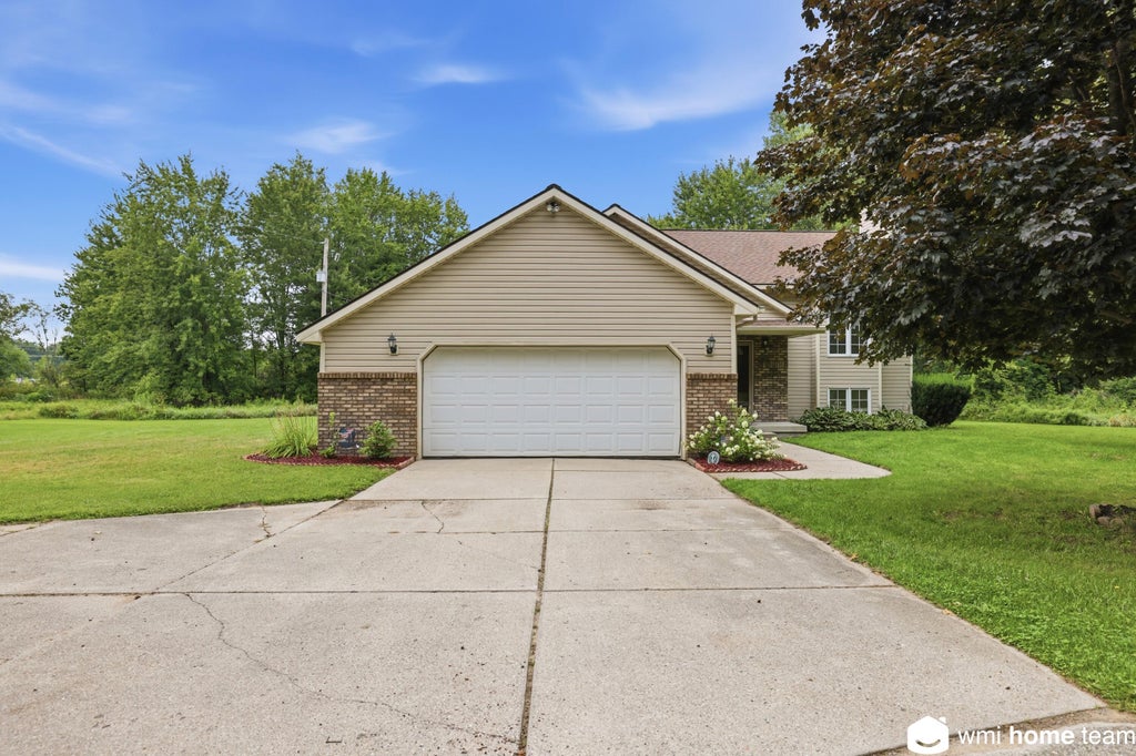 Photo of 5303 Tiffany Avenue NE, Rockford, MI 49341 (MLS # 26042393)