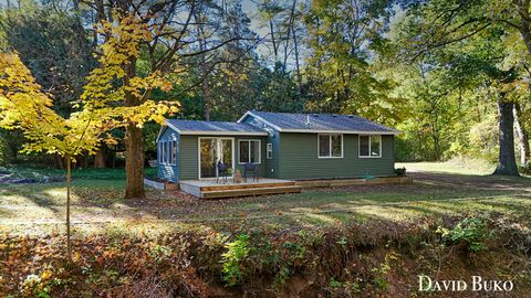 Photo of 1875 11 Mile Road NE, Comstock Park, MI 49321 (MLS # 25053807)