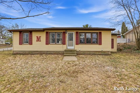 Photo of 408 Brady Street NW, Comstock Park, MI 49321 (MLS # 26009281)