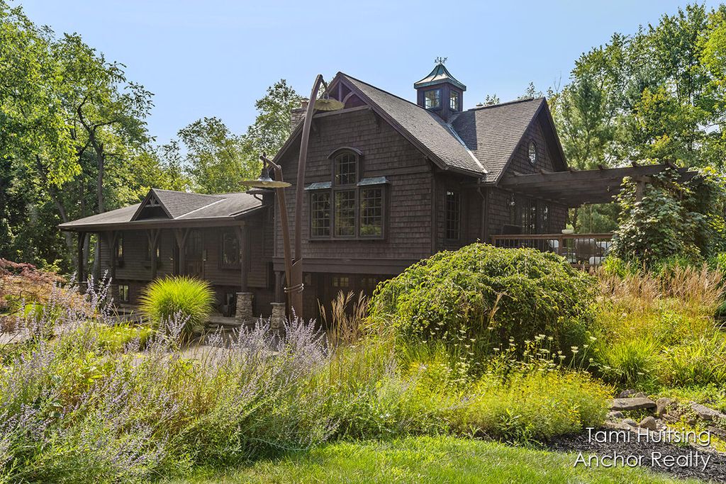 Photo of 5501 Canyon River Drive NE, Ada, MI 49301 (MLS # 24042927)