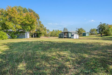 Photo of 1215 Bear Avenue, Harrison, MI 48625 (MLS # 25048720)