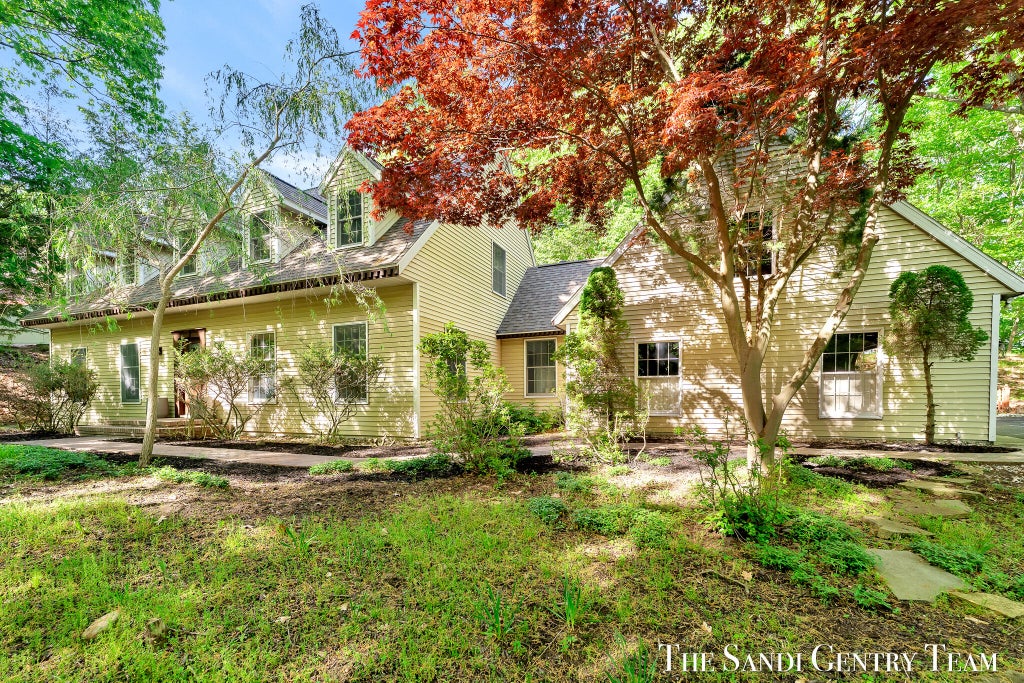 Photo of 309 Stickney Ridge Road, Grand Haven, MI 49417 (MLS # 26016055)