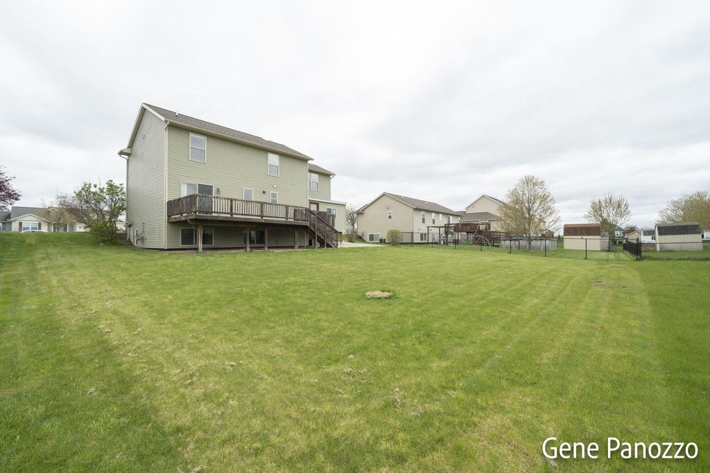 Photo of 6465 Dew Pointe Avenue SE, Caledonia, MI 49316 (MLS # 24040010)