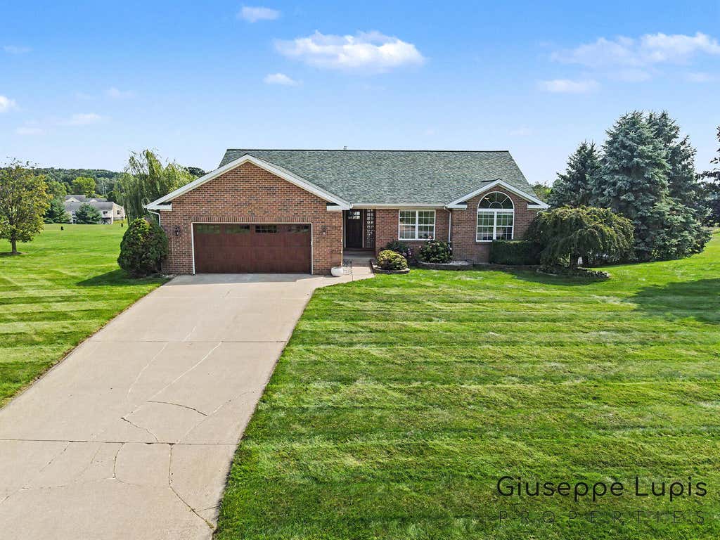 Photo of 5870 Terrace Ridge Drive NE, Rockford, MI 49341 (MLS # 26043799)