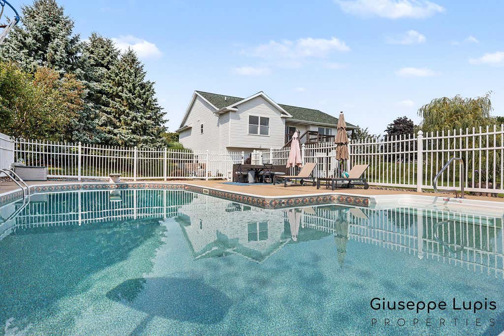 Photo of 5870 Terrace Ridge Drive NE, Rockford, MI 49341 (MLS # 26043799)