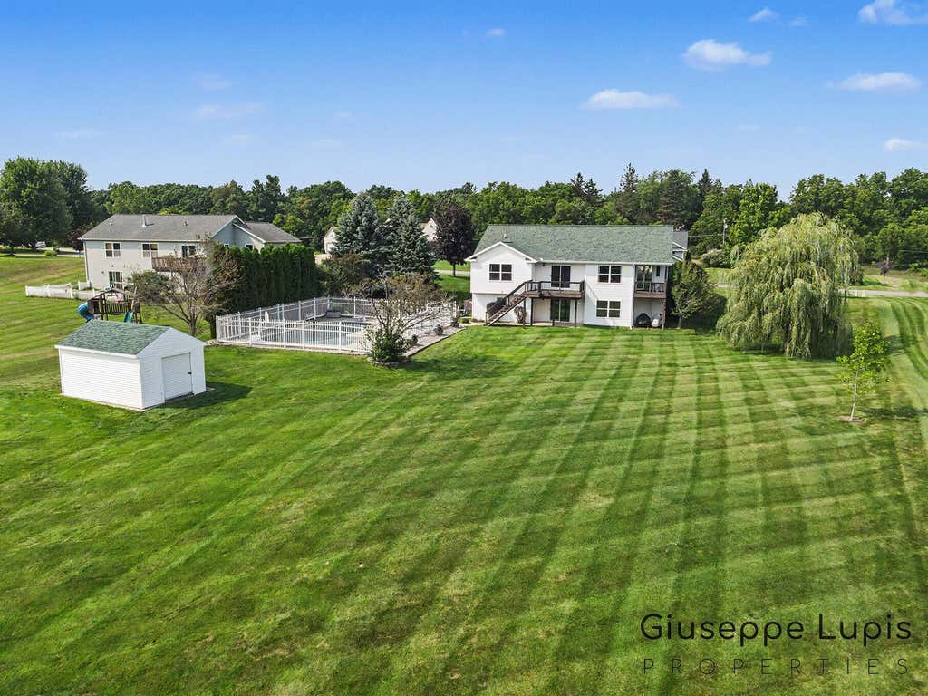 Photo of 5870 Terrace Ridge Drive NE, Rockford, MI 49341 (MLS # 26043799)
