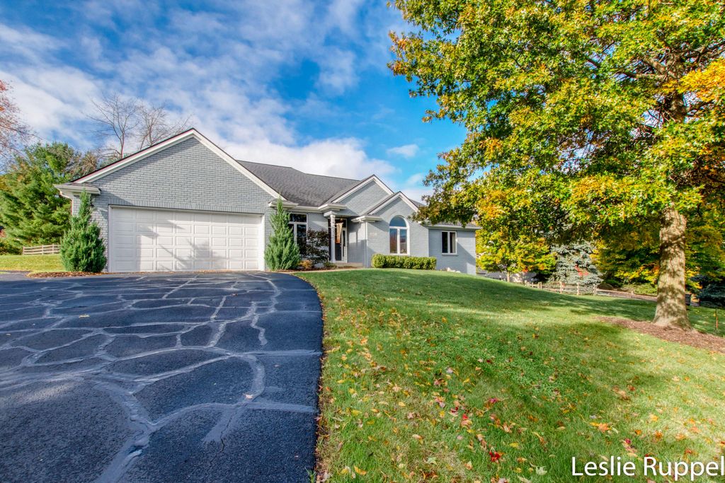 Photo of 2357 Grand Valley Drive NE, Ada, MI 49301 (MLS # 25054741)