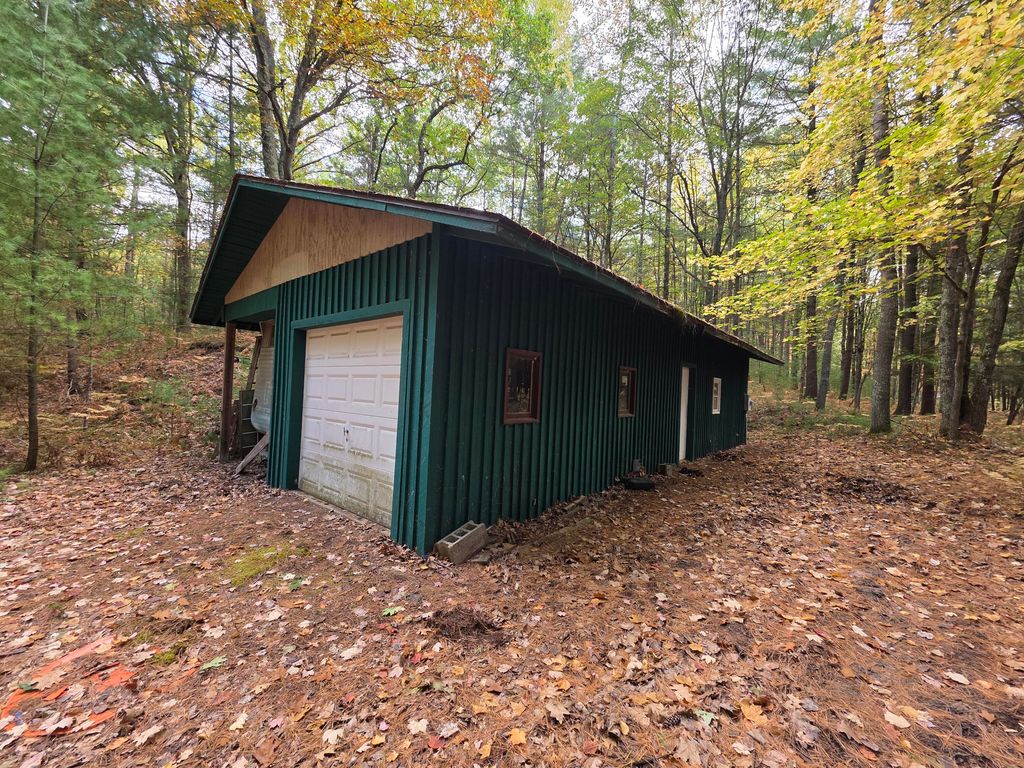 Photo of 6900 N 27 Road Road, Manton, MI 49663 (MLS # 25052429)