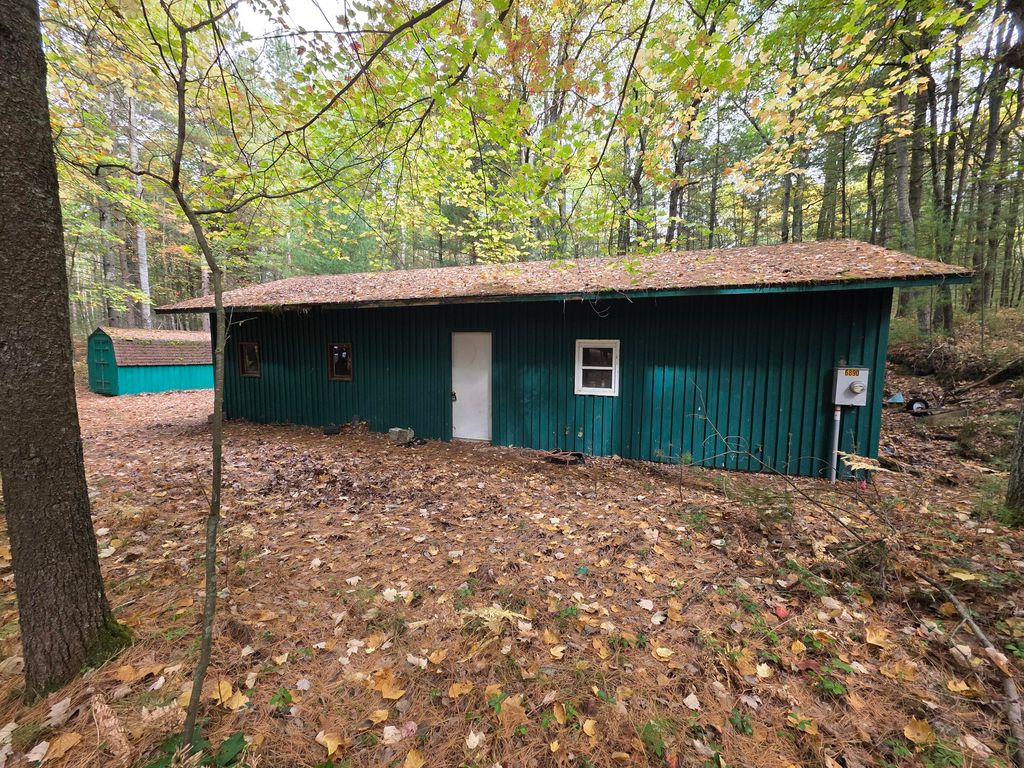 Photo of 6900 N 27 Road Road, Manton, MI 49663 (MLS # 25052429)