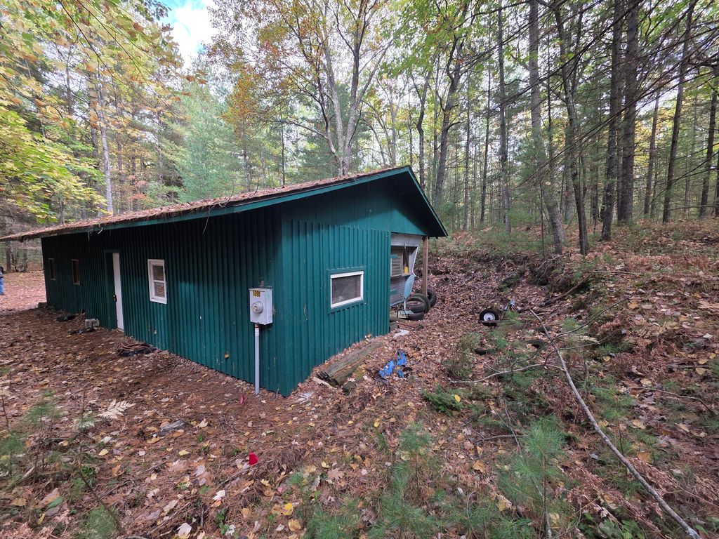 Photo of 6900 N 27 Road Road, Manton, MI 49663 (MLS # 25052429)