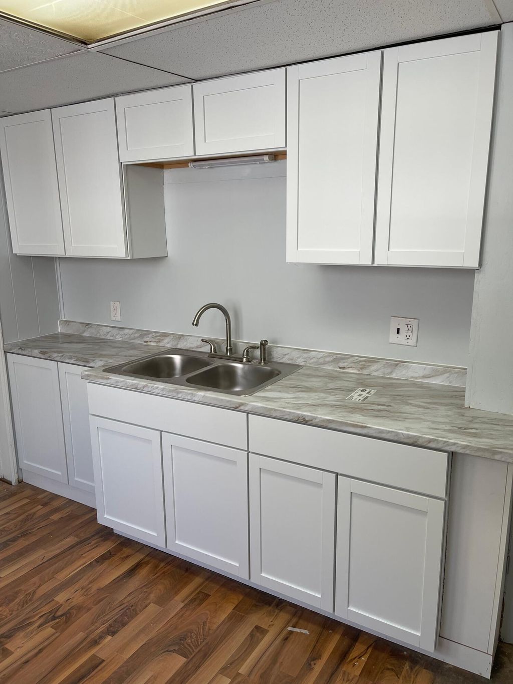 Photo of 1119 E Apple Avenue, Muskegon, MI 49442 (MLS # 25060140)