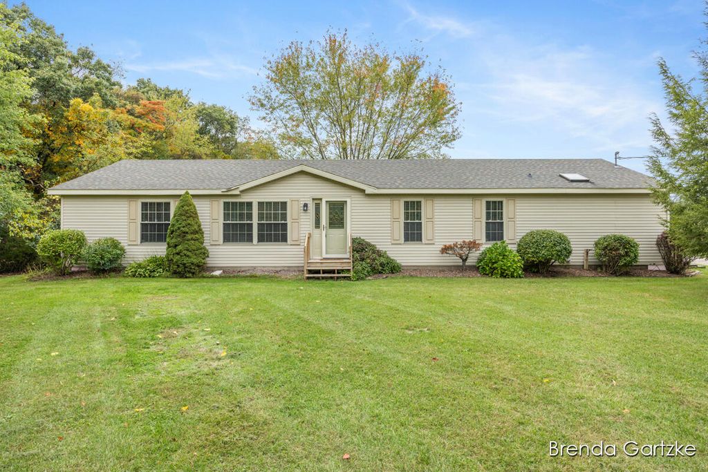 Photo of 11025 Heintzelman Avenue NE, Rockford, MI 49341 (MLS # 25052668)
