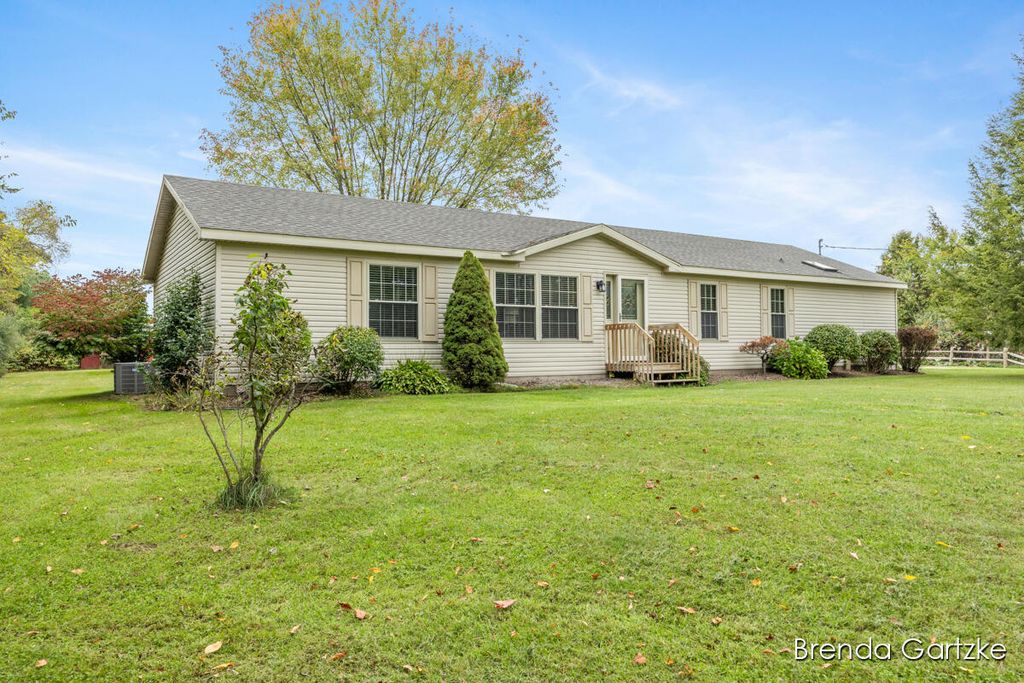 Photo of 11025 Heintzelman Avenue NE, Rockford, MI 49341 (MLS # 25052668)