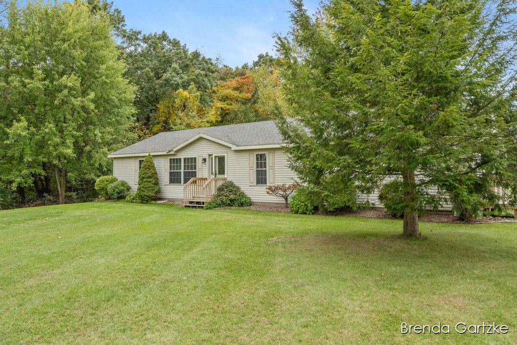Photo of 11025 Heintzelman Avenue NE, Rockford, MI 49341 (MLS # 25052668)