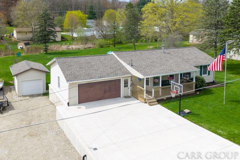 Photo of 5045 Wakefield Avenue NE, Comstock Park, MI 49321 (MLS # 26016662)