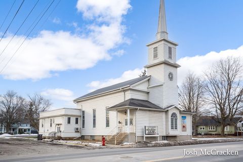 Photo of 404 N Hudson Street SE, Lowell, MI 49331 (MLS # 26000718)
