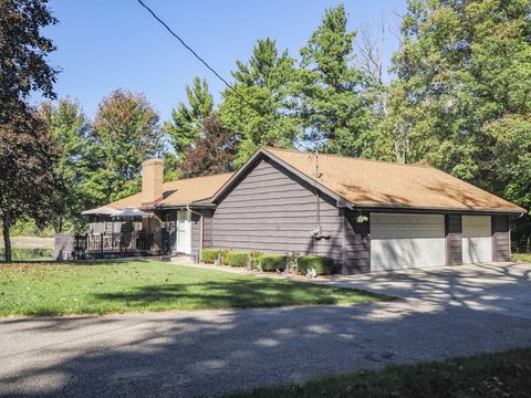 Photo of 9411 N MAPLE HILL RD Road, Howard City, MI 49329 (MLS # 25052667)