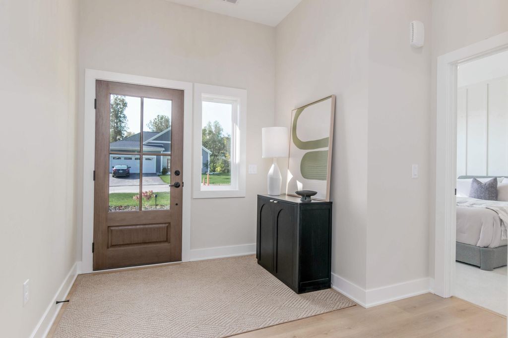 Photo of 4708 Knapp Bluff Drive NE, Grand Rapids, MI 49525 (MLS # 25056269)