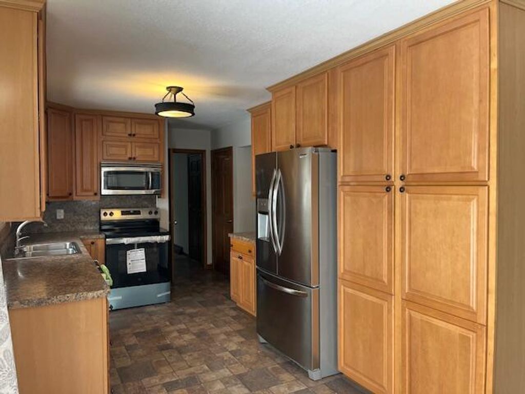 Photo of 1548 Woodside Road, Muskegon, MI 49441 (MLS # 26003805)