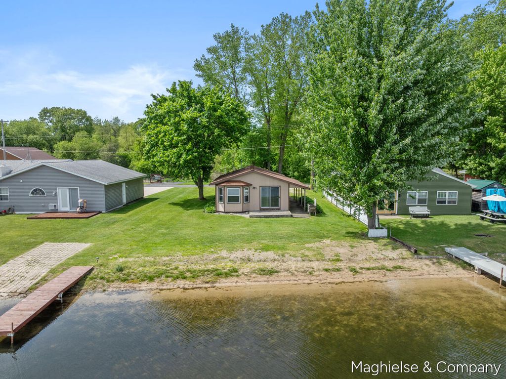 Photo of 9048 Loveless Drive NE, Rockford, MI 49341 (MLS # 26025195)