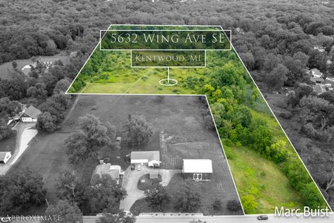 Photo of 5632 Wing Avenue SE, Kentwood, MI 49512 (MLS # 23031677)